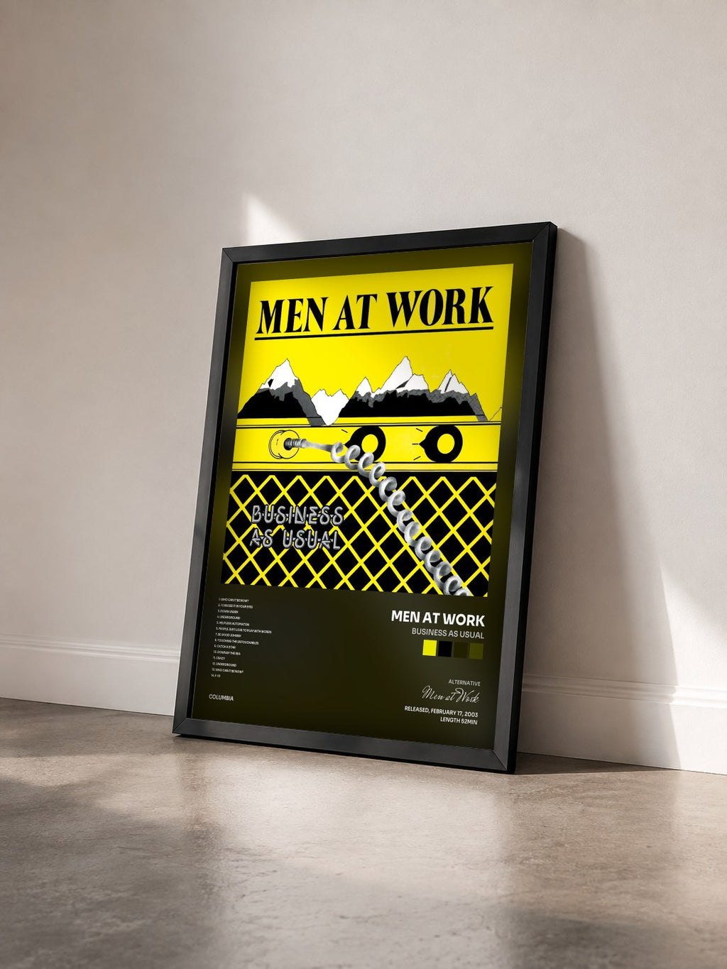 #noir Tableau de l'album Business As Usual de Men at Work vu de trois quarts, cadre noir