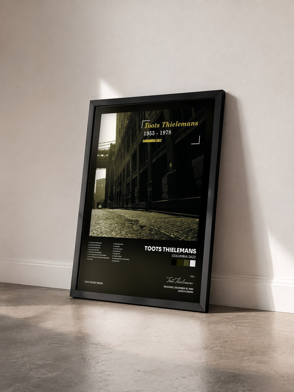 #noir Tableau de l'album Columbia Jazz de Toots Thielemans vu de trois quarts, cadre noir