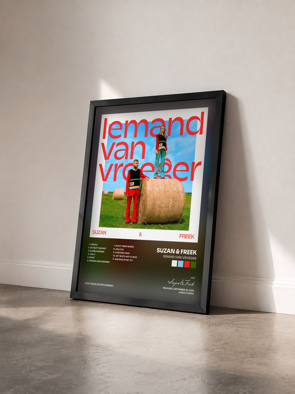 #noir Tableau de l'album Iemand Van Vroeger de Suzan & Freek vu de trois quarts, cadre noir