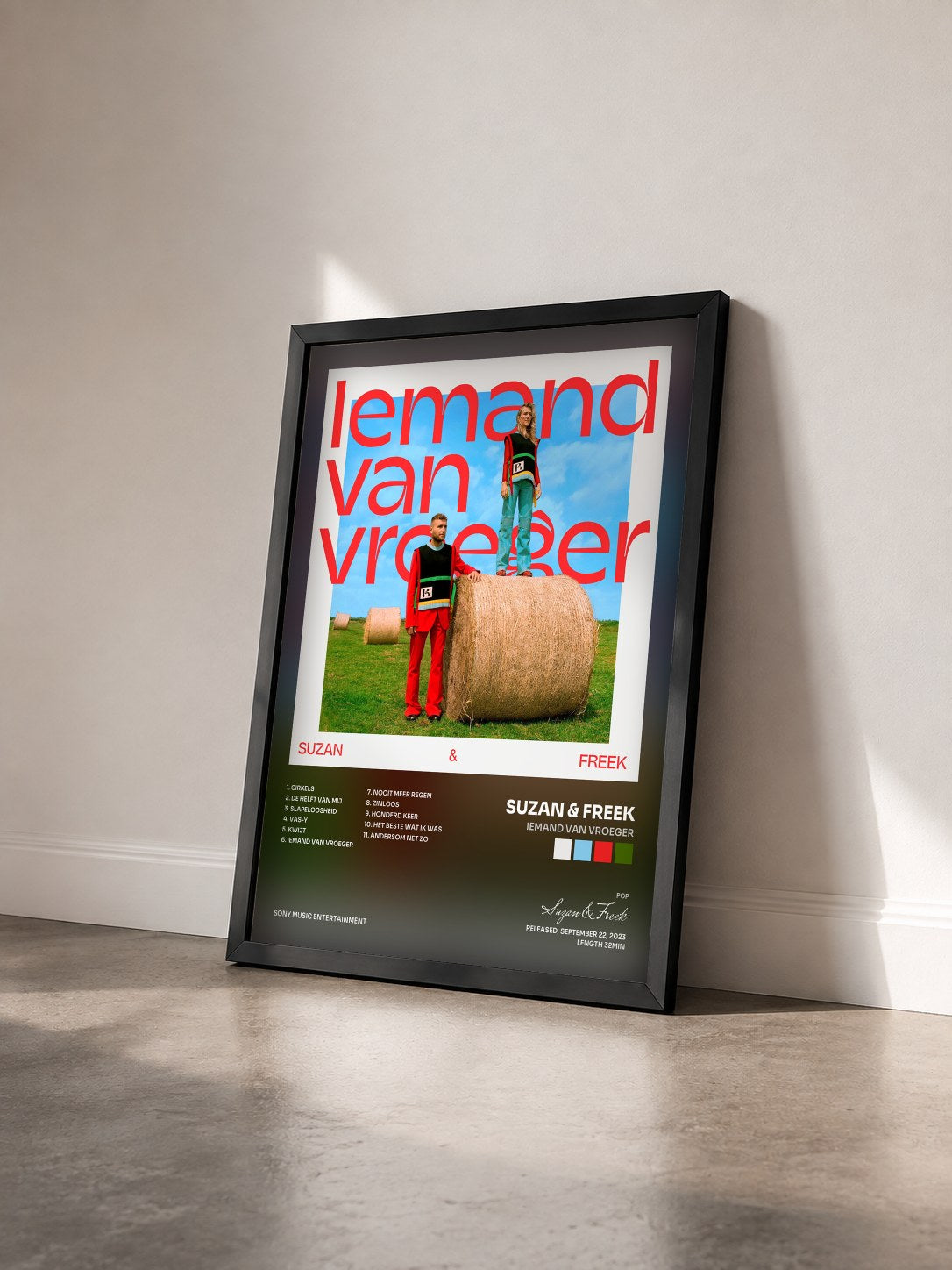 #noir Tableau de l'album Iemand Van Vroeger de Suzan & Freek vu de trois quarts, cadre noir