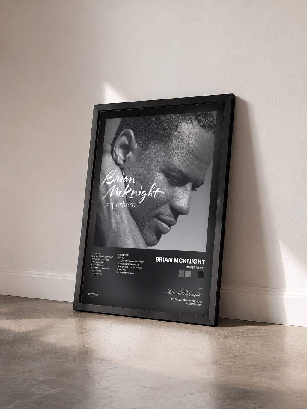 #noir Tableau de l'album Superhero de Brian McKnight vu de trois quarts, cadre noir