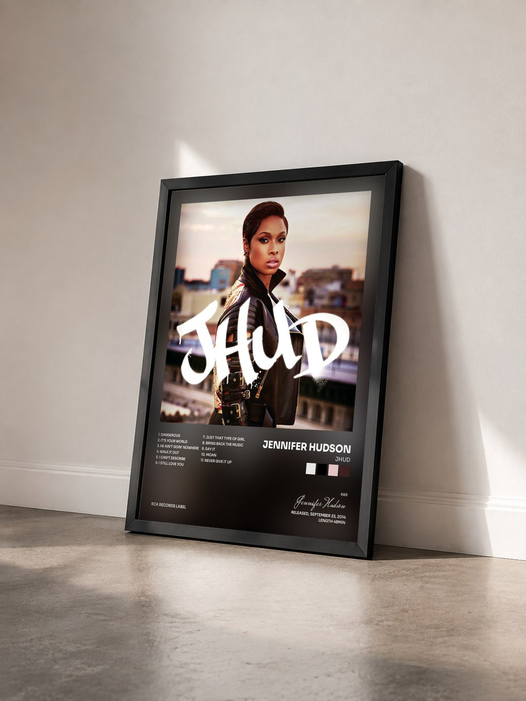 #noir Tableau de l'album JHUD de Jennifer Hudson vu de trois quarts, cadre noir