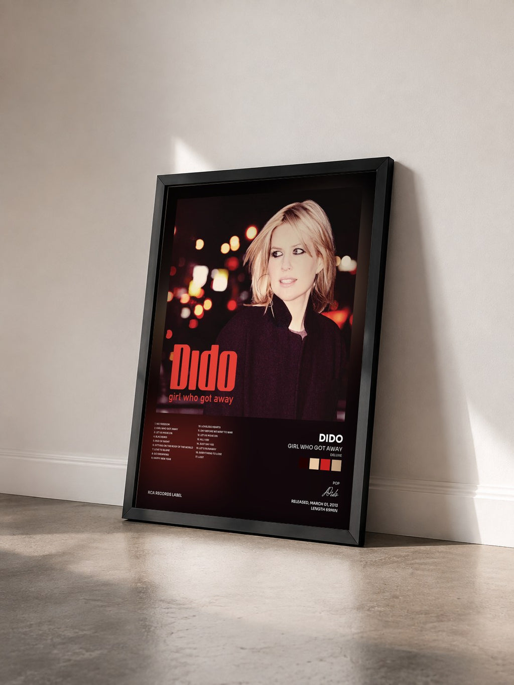 #noir Tableau de l'album Girl Who Got Away (Deluxe) de Dido vu de trois quarts, cadre noir