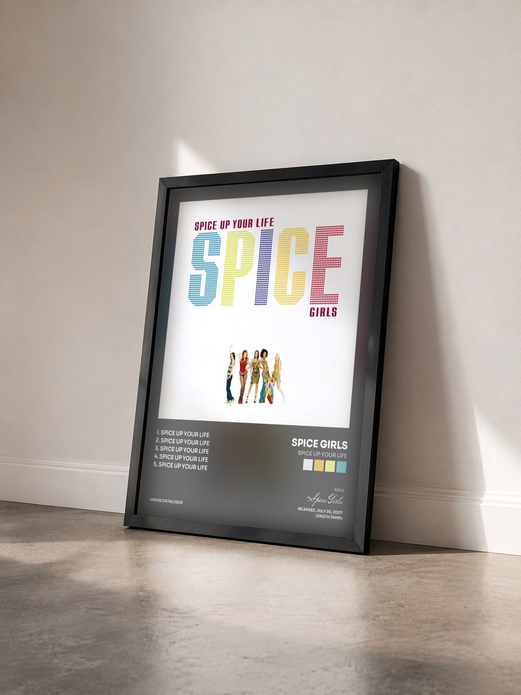 #noir Tableau de l'album Spice Up Your Life de Spice Girls vu de trois quarts, cadre noir