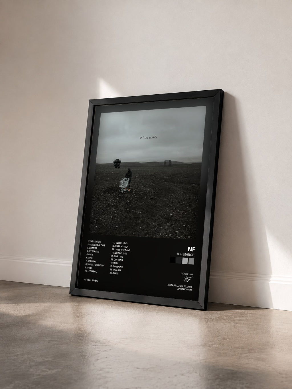 #noir Tableau de l'album The Search de NF vu de trois quarts, cadre noir