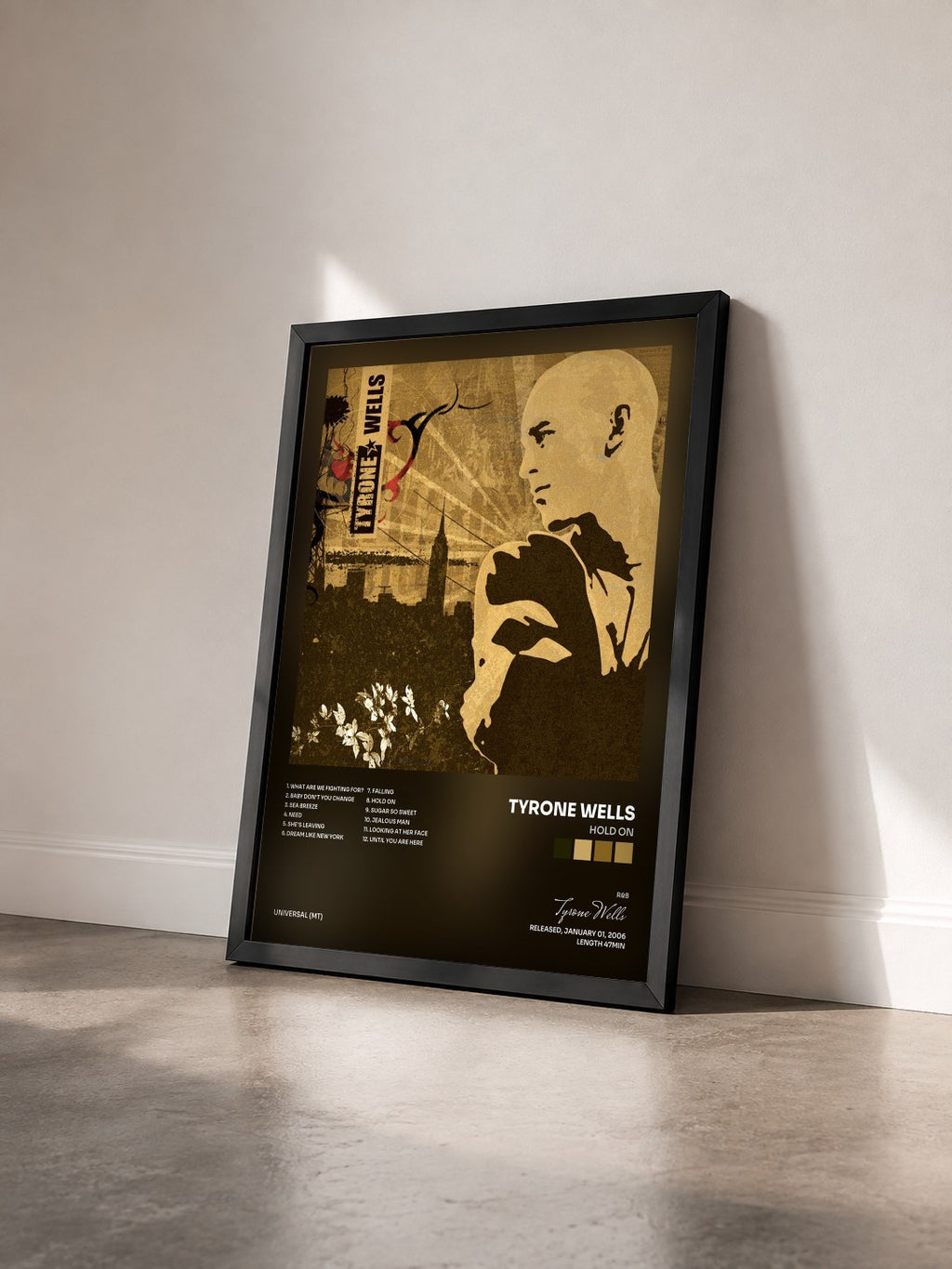 #noir Tableau de l'album Hold On de Tyrone Wells vu de trois quarts, cadre noir