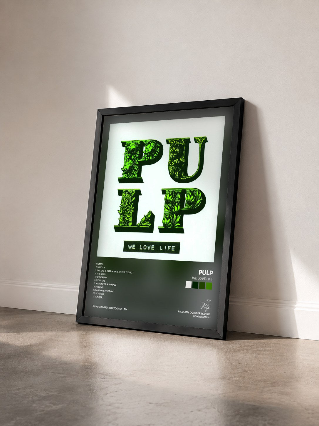 #noir Tableau de l'album We Love Life de Pulp vu de trois quarts, cadre noir