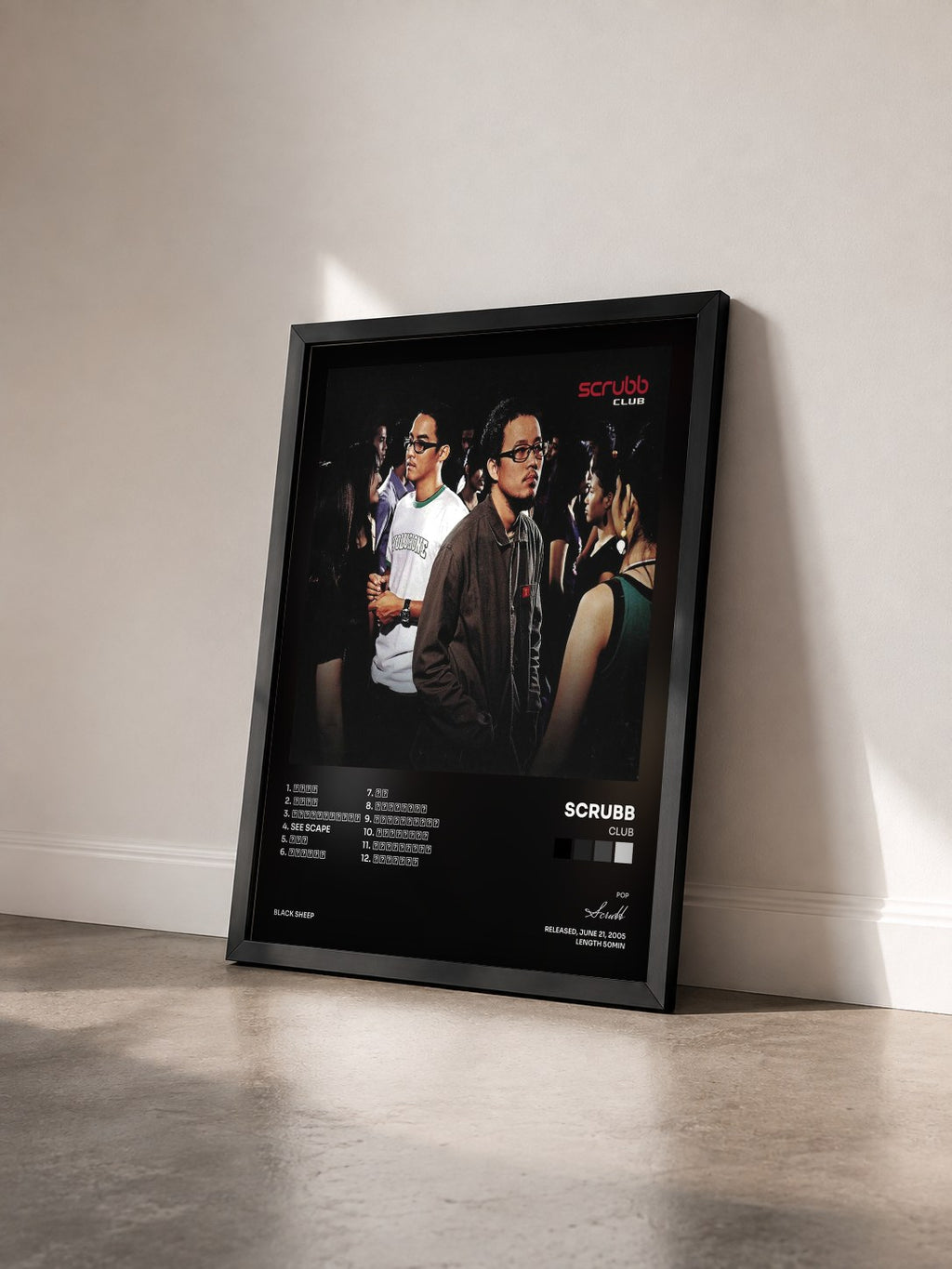 #noir Tableau de l'album Club de Scrubb vu de trois quarts, cadre noir