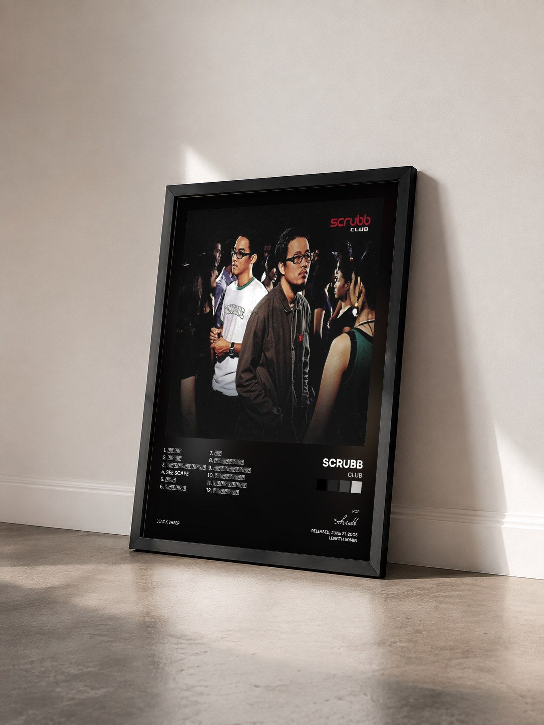 #noir Tableau de l'album Club de Scrubb vu de trois quarts, cadre noir