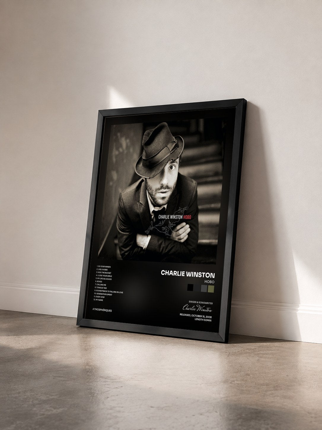 #noir Tableau de l'album Hobo de Charlie Winston vu de trois quarts, cadre noir