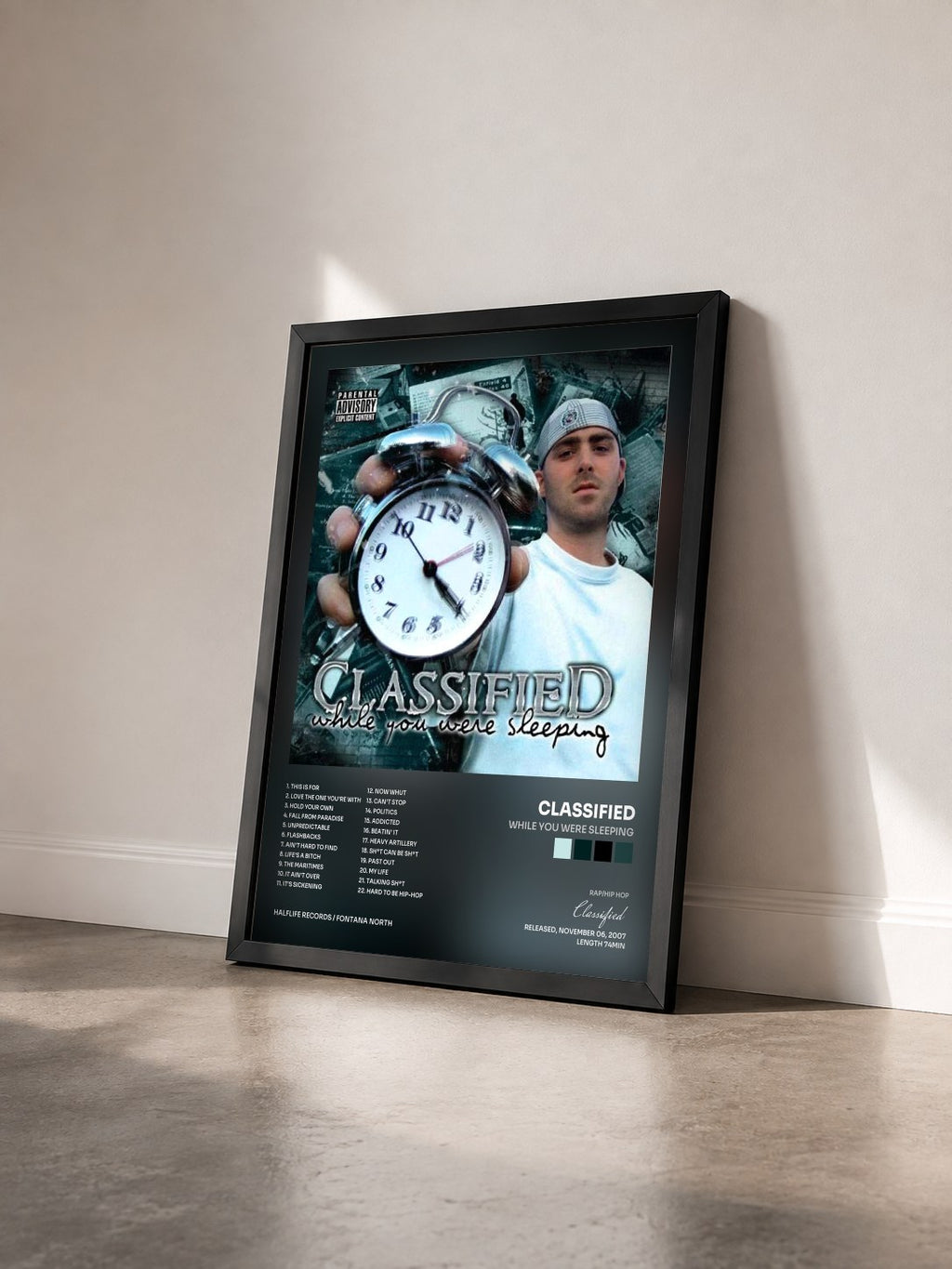 #noir Tableau de l'album While You Were Sleeping de Classified vu de trois quarts, cadre noir
