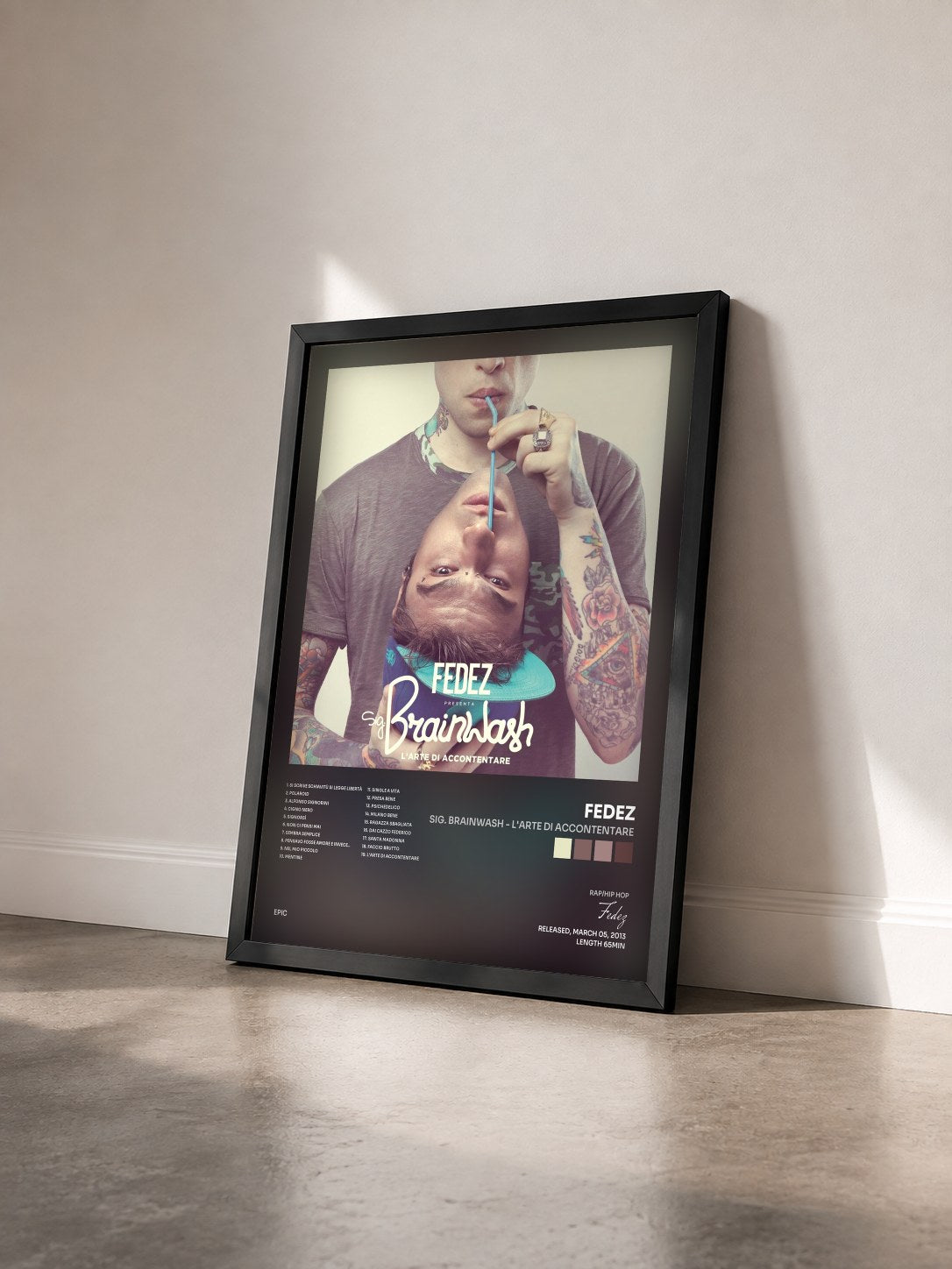 #noir Tableau de l'album Sig. Brainwash - L'arte di accontentare de Fedez vu de trois quarts, cadre noir
