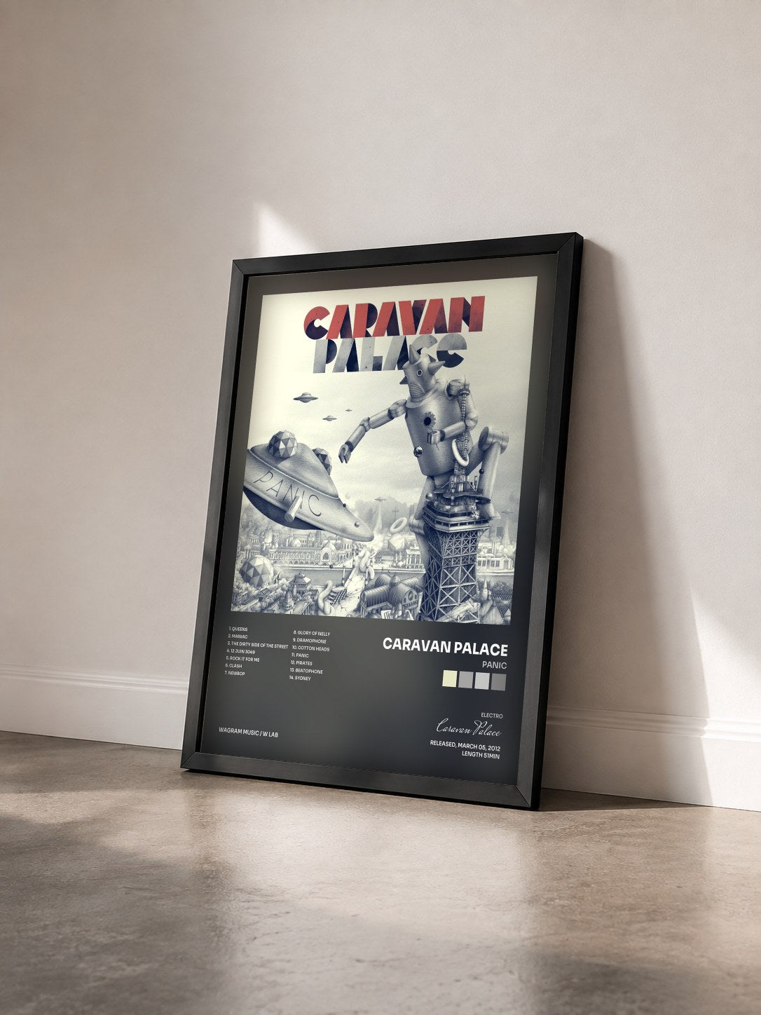 #noir Tableau de l'album Panic de Caravan Palace vu de trois quarts, cadre noir
