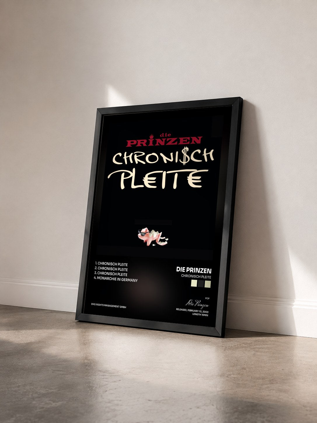 #noir Tableau de l'album Chronisch Pleite de Die Prinzen vu de trois quarts, cadre noir