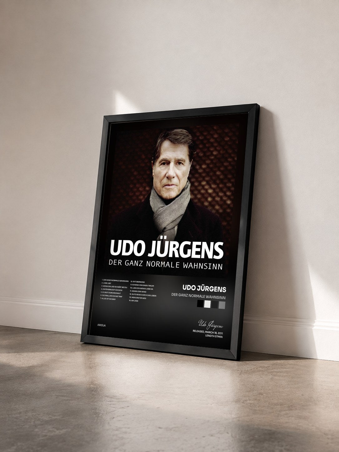 #noir Tableau de l'album Der ganz normale Wahnsinn de Udo Jürgens vu de trois quarts, cadre noir