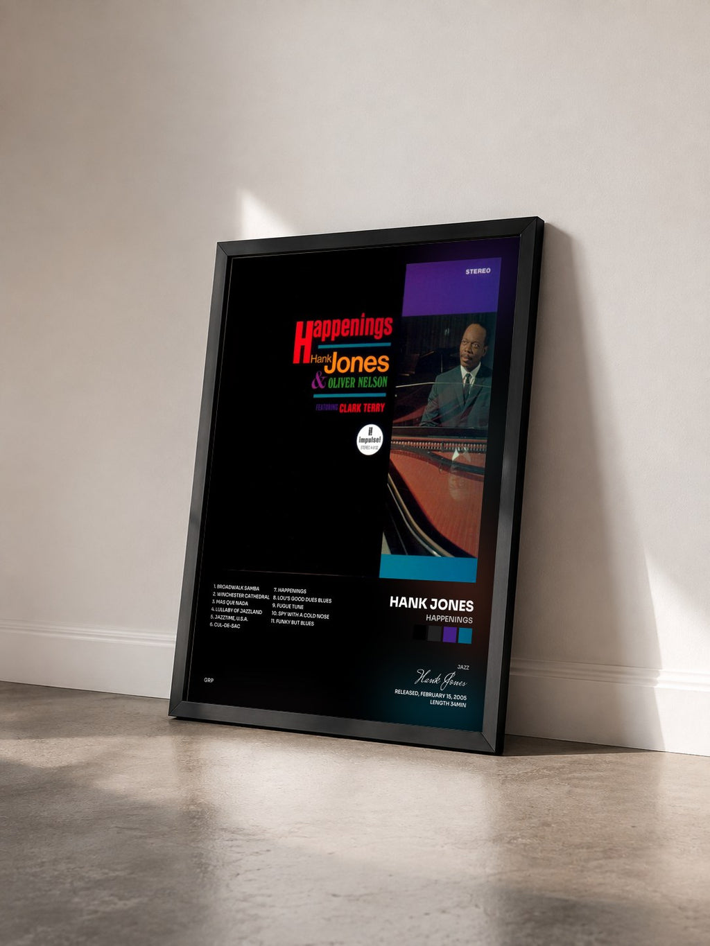 #noir Tableau de l'album Happenings de Hank Jones vu de trois quarts, cadre noir