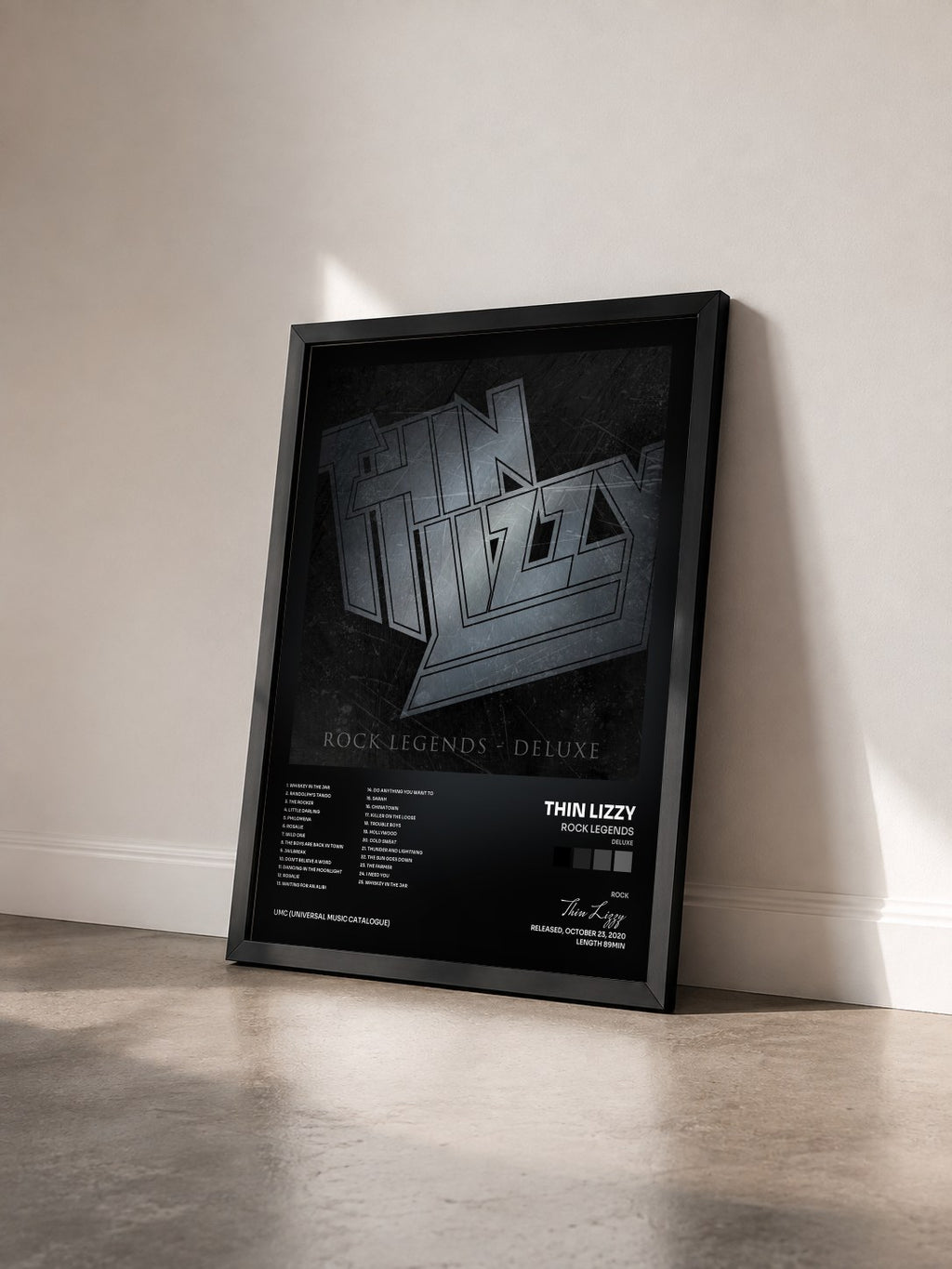 #noir Tableau de l'album Rock Legends (Deluxe) de Thin Lizzy vu de trois quarts, cadre noir