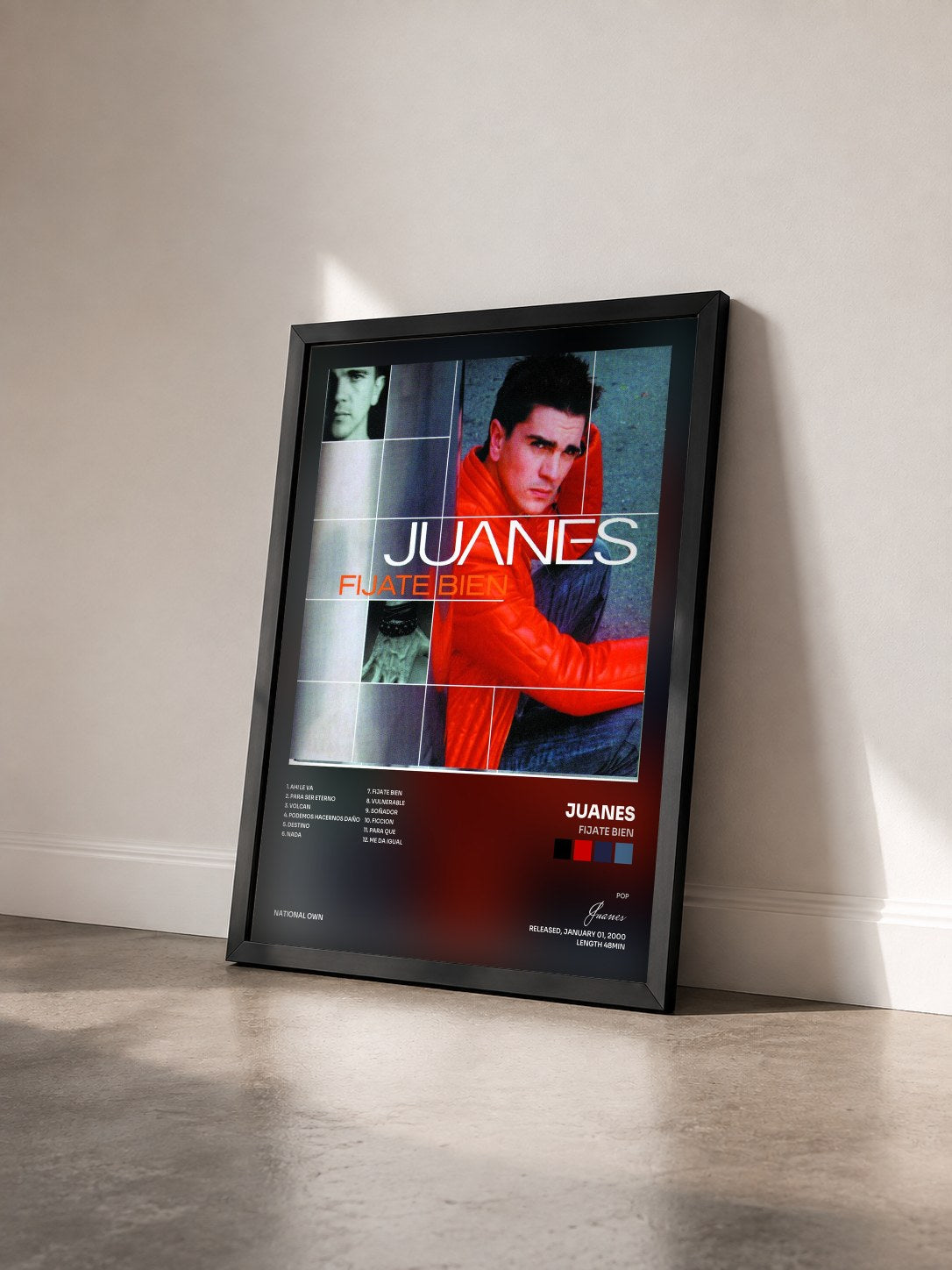 #noir Tableau de l'album Fijate Bien de Juanes vu de trois quarts, cadre noir