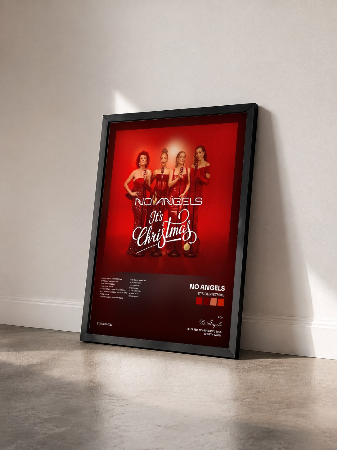 #noir Tableau de l'album It's Christmas de No Angels vu de trois quarts, cadre noir