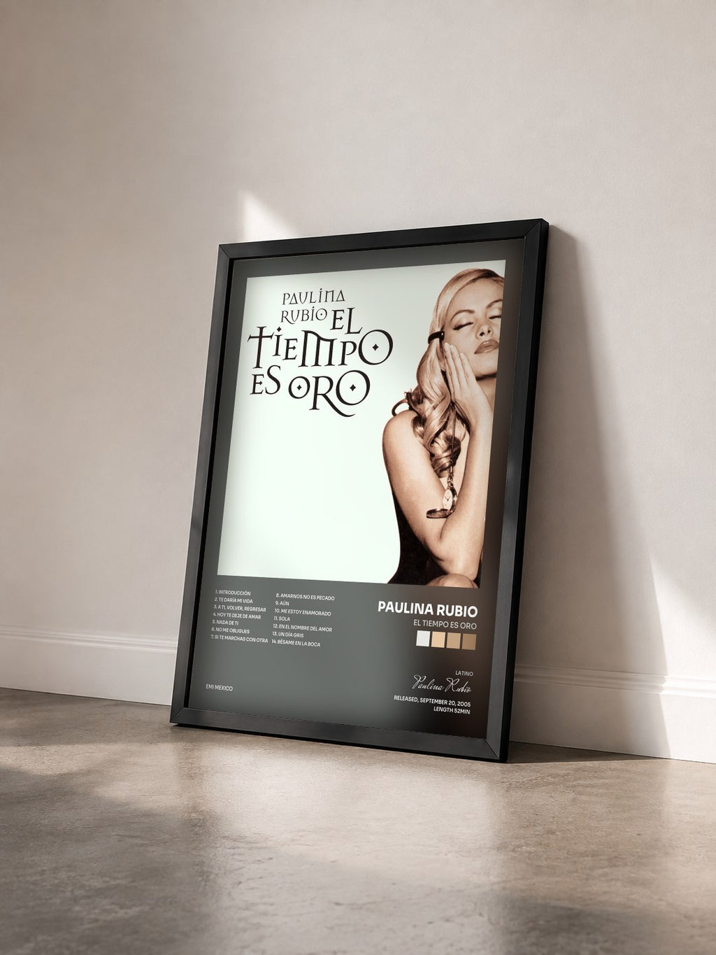 #noir Tableau de l'album El Tiempo Es Oro de Paulina Rubio vu de trois quarts, cadre noir