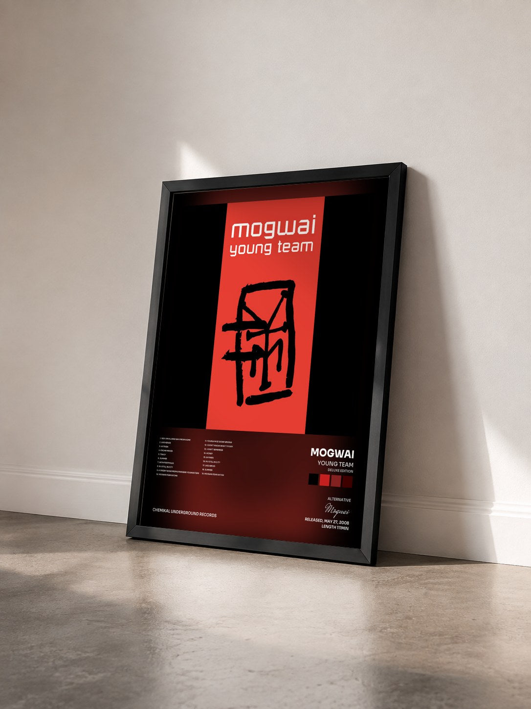 #noir Tableau de l'album Young Team (Deluxe Edition) de Mogwai vu de trois quarts, cadre noir