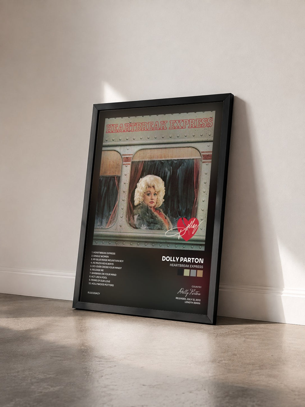 #noir Tableau de l'album Heartbreak Express de Dolly Parton vu de trois quarts, cadre noir