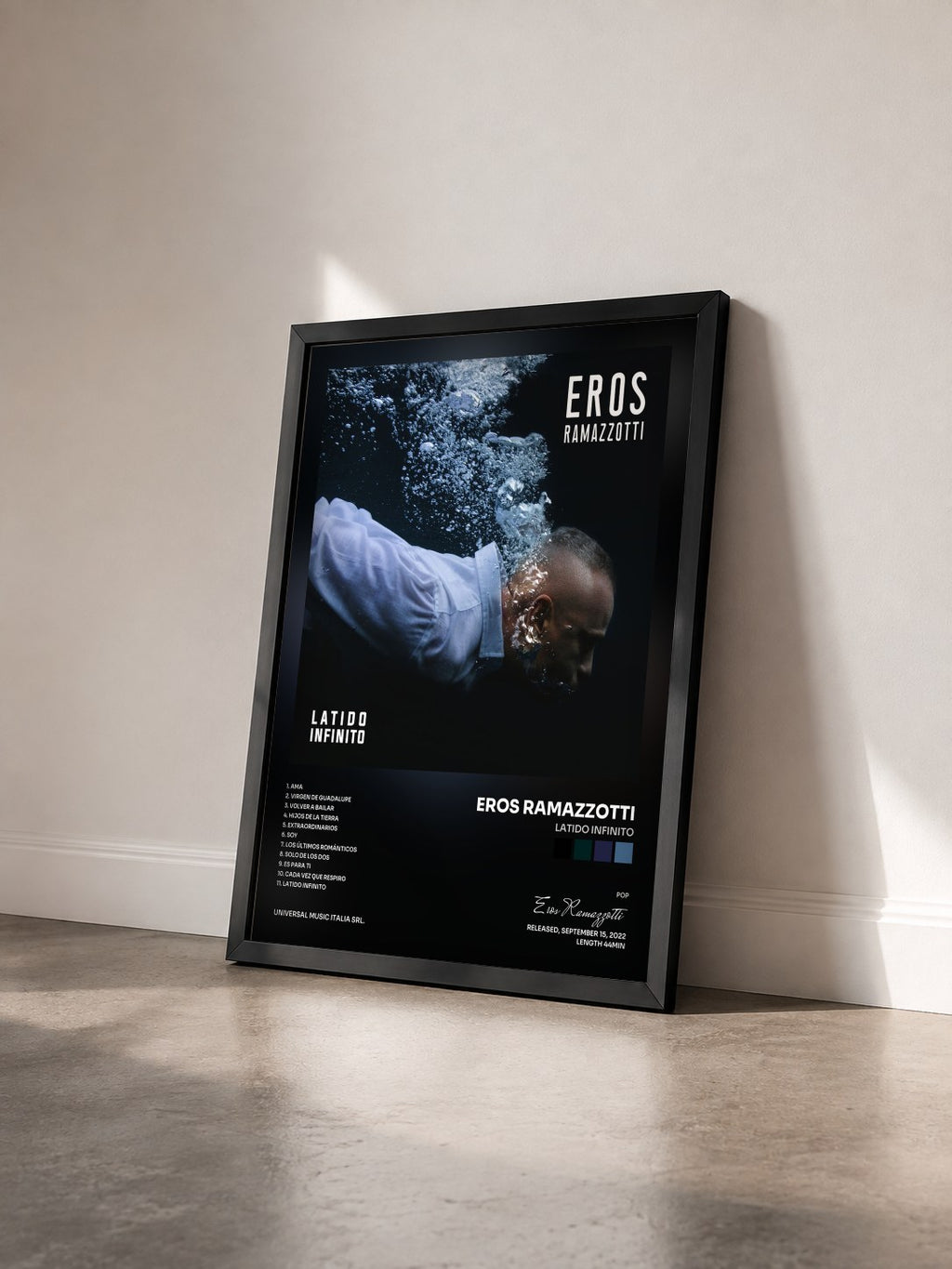 #noir Tableau de l'album Latido Infinito de Eros Ramazzotti vu de trois quarts, cadre noir