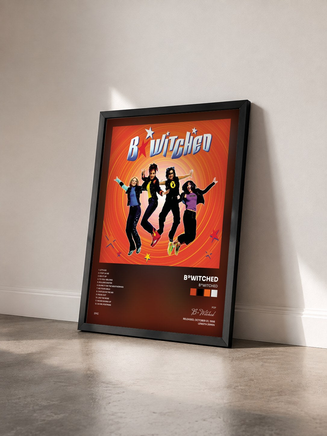 #noir Tableau de l'album B*Witched de B*Witched vu de trois quarts, cadre noir