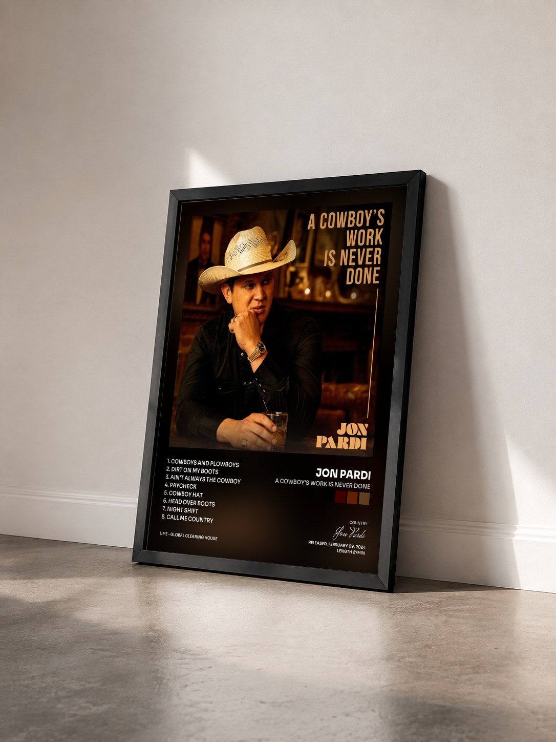 #noir Tableau de l'album A Cowboy's Work Is Never Done de Jon Pardi vu de trois quarts, cadre noir