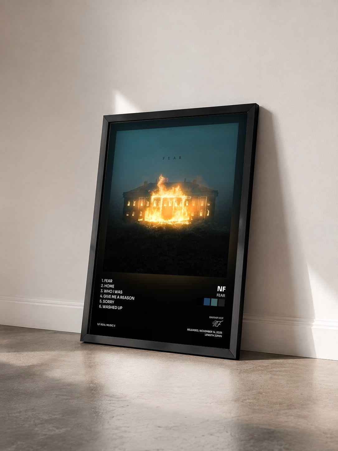 #noir Tableau de l'album FEAR de NF vu de trois quarts, cadre noir