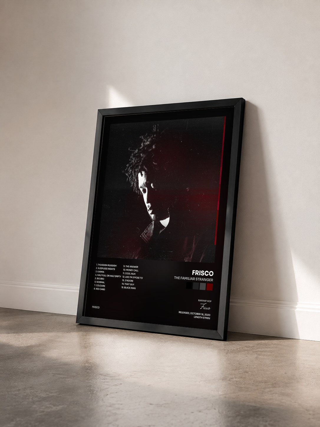 #noir Tableau de l'album The Familiar Stranger de Frisco vu de trois quarts, cadre noir