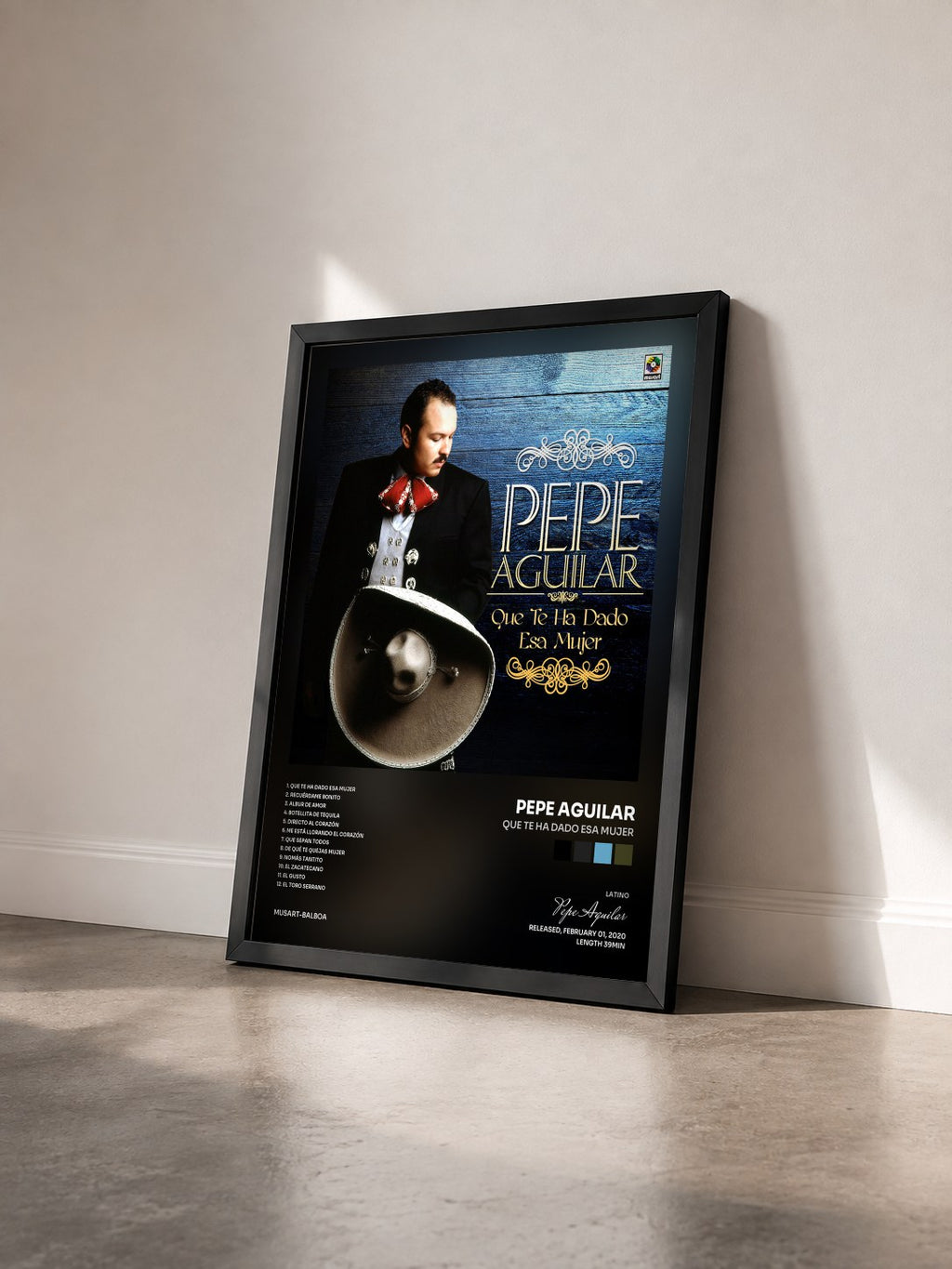 #noir Tableau de l'album Que Te Ha Dado Esa Mujer de Pepe Aguilar vu de trois quarts, cadre noir