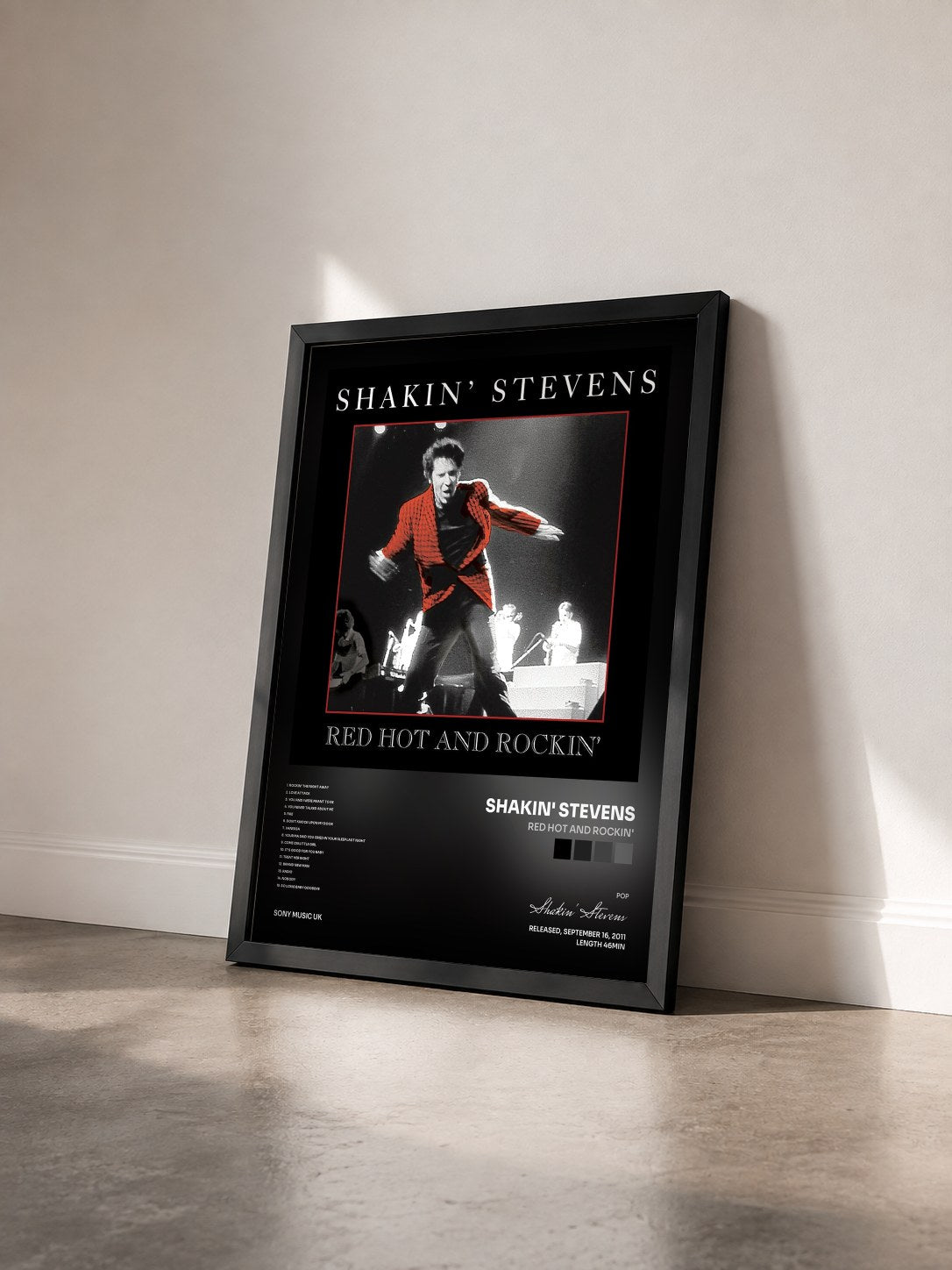 #noir Tableau de l'album Red Hot and Rockin' de Shakin' Stevens vu de trois quarts, cadre noir