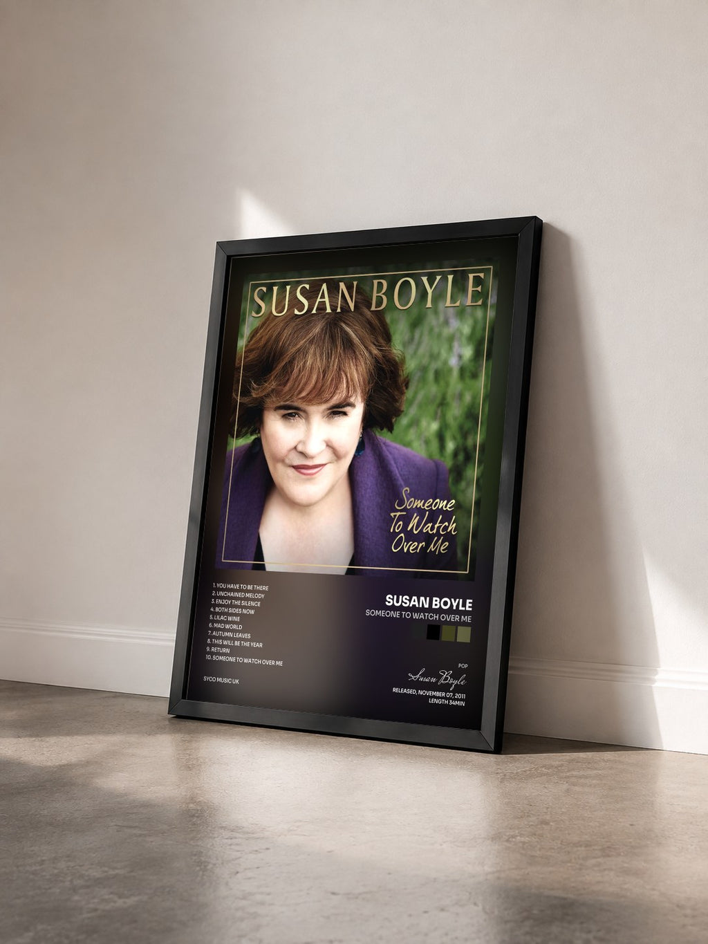 #noir Tableau de l'album Someone to Watch Over Me de Susan Boyle vu de trois quarts, cadre noir