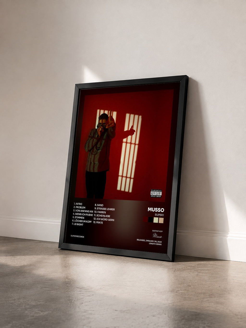 #noir Tableau de l'album SUPER1 de Musso vu de trois quarts, cadre noir