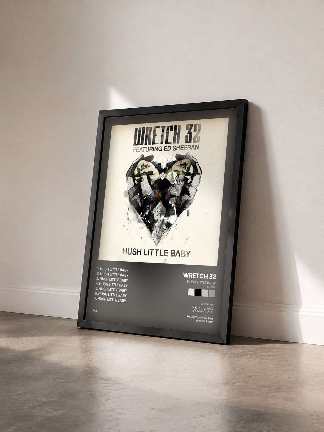 #noir Tableau de l'album Hush Little Baby (Remixes) de Wretch 32 vu de trois quarts, cadre noir