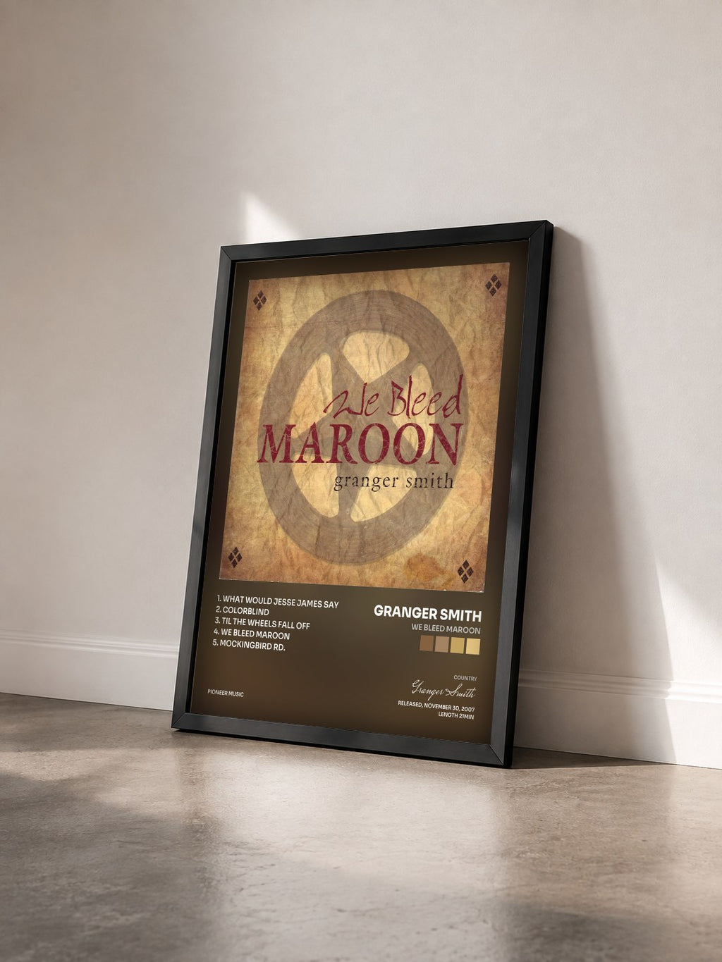 #noir Tableau de l'album We Bleed Maroon de Granger Smith vu de trois quarts, cadre noir