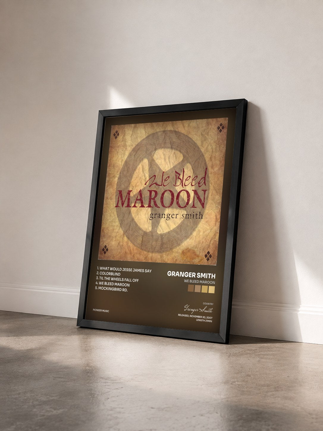 #noir Tableau de l'album We Bleed Maroon de Granger Smith vu de trois quarts, cadre noir