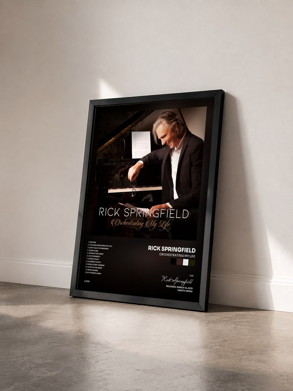 #noir Tableau de l'album Orchestrating My Life de Rick Springfield vu de trois quarts, cadre noir