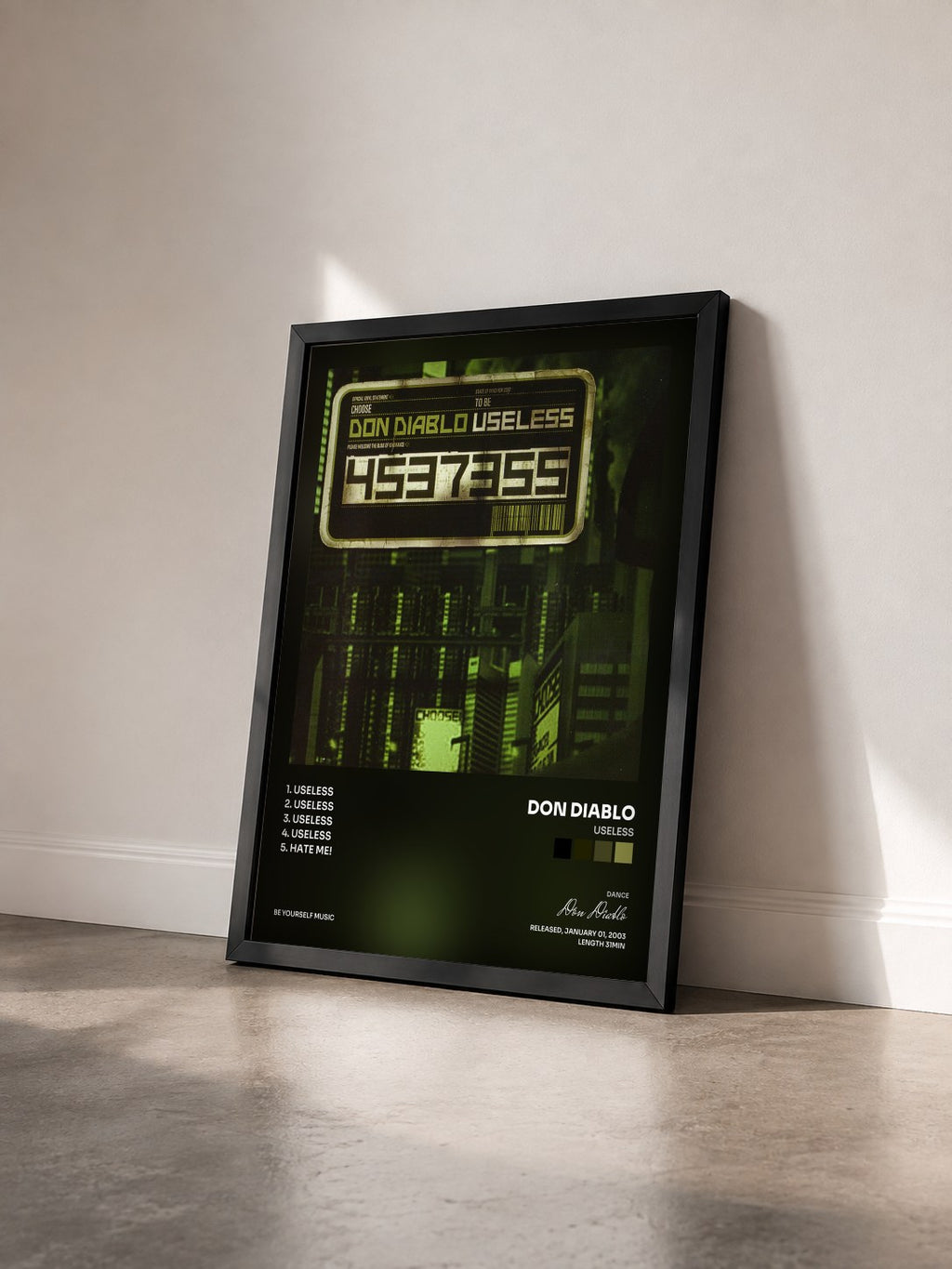 #noir Tableau de l'album Useless de Don Diablo vu de trois quarts, cadre noir