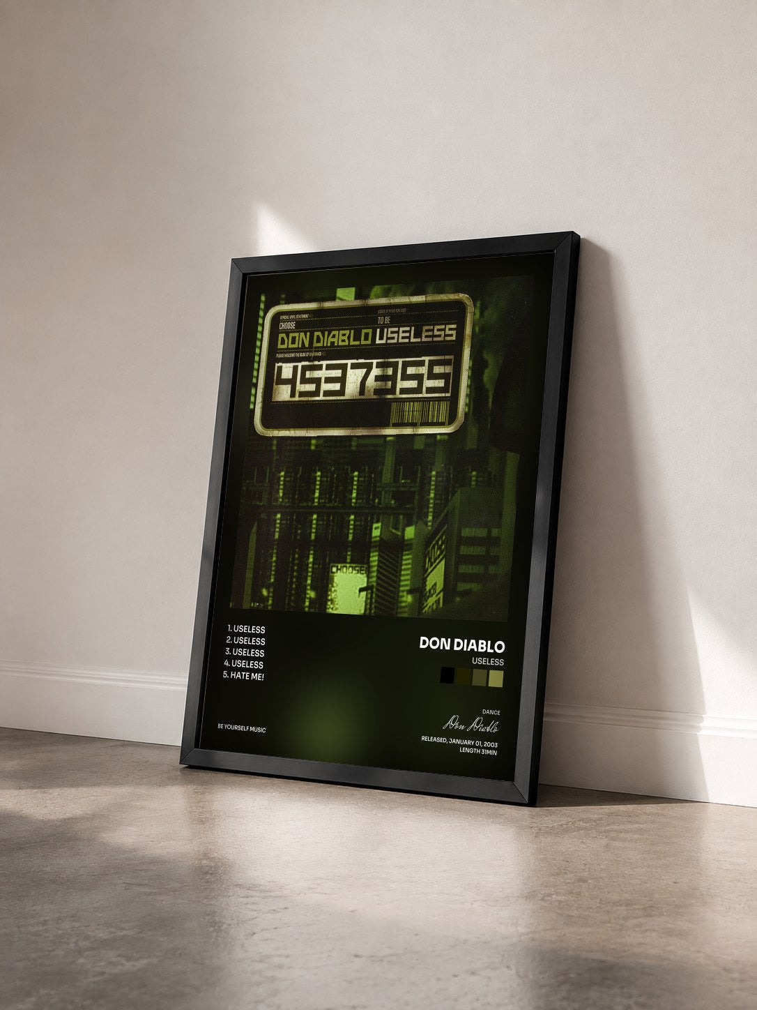 #noir Tableau de l'album Useless de Don Diablo vu de trois quarts, cadre noir