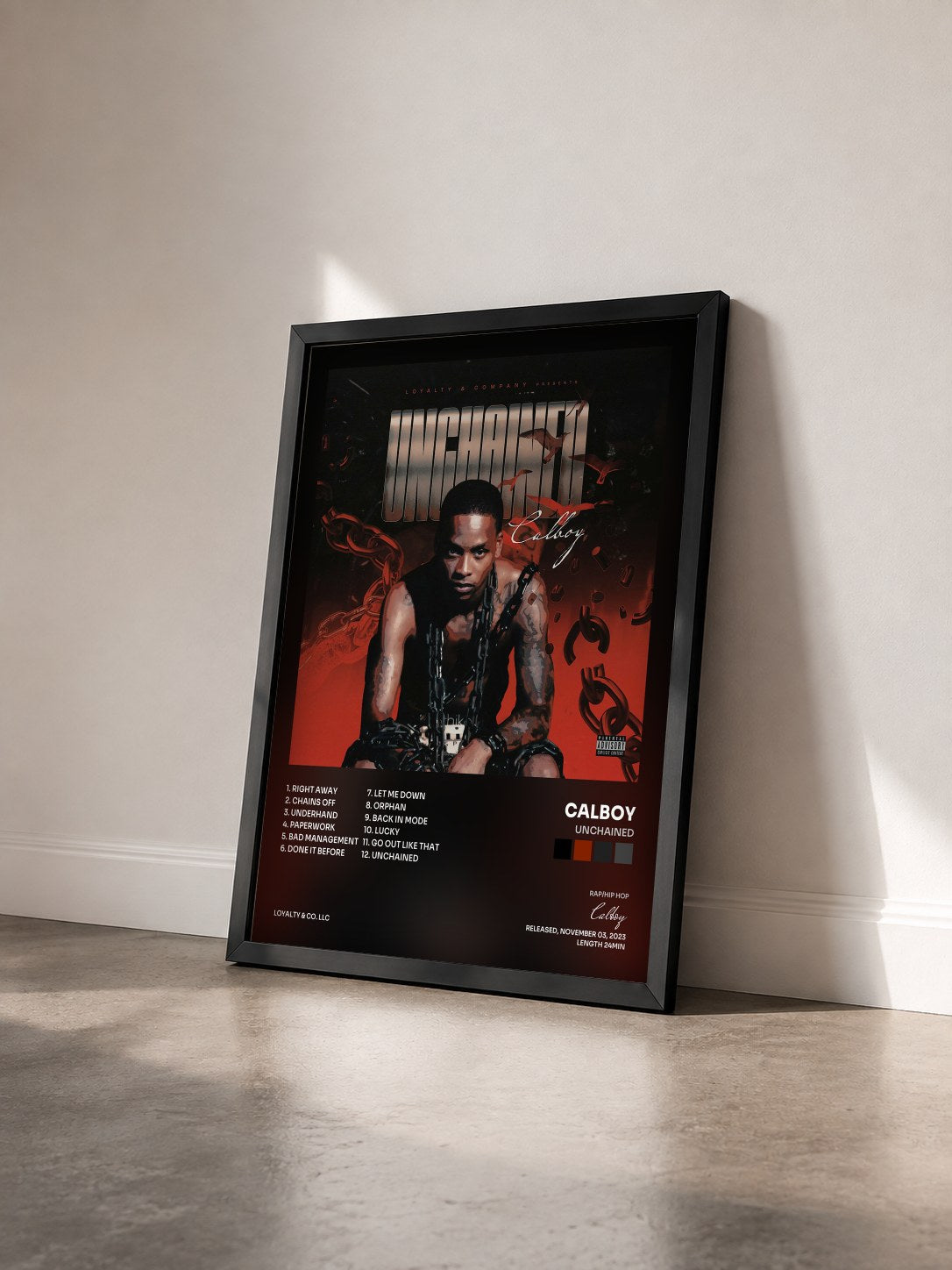 #noir Tableau de l'album UNCHAINED de Calboy vu de trois quarts, cadre noir