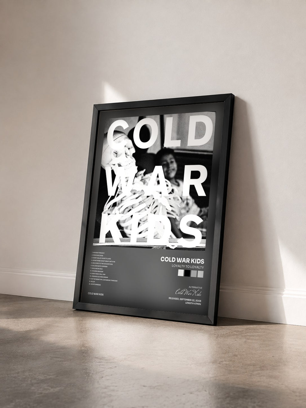 #noir Tableau de l'album Loyalty To Loyalty de Cold War Kids vu de trois quarts, cadre noir