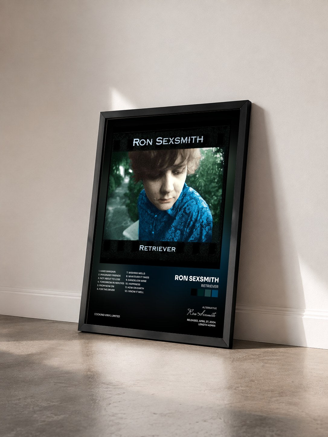 #noir Tableau de l'album Retriever de Ron Sexsmith vu de trois quarts, cadre noir