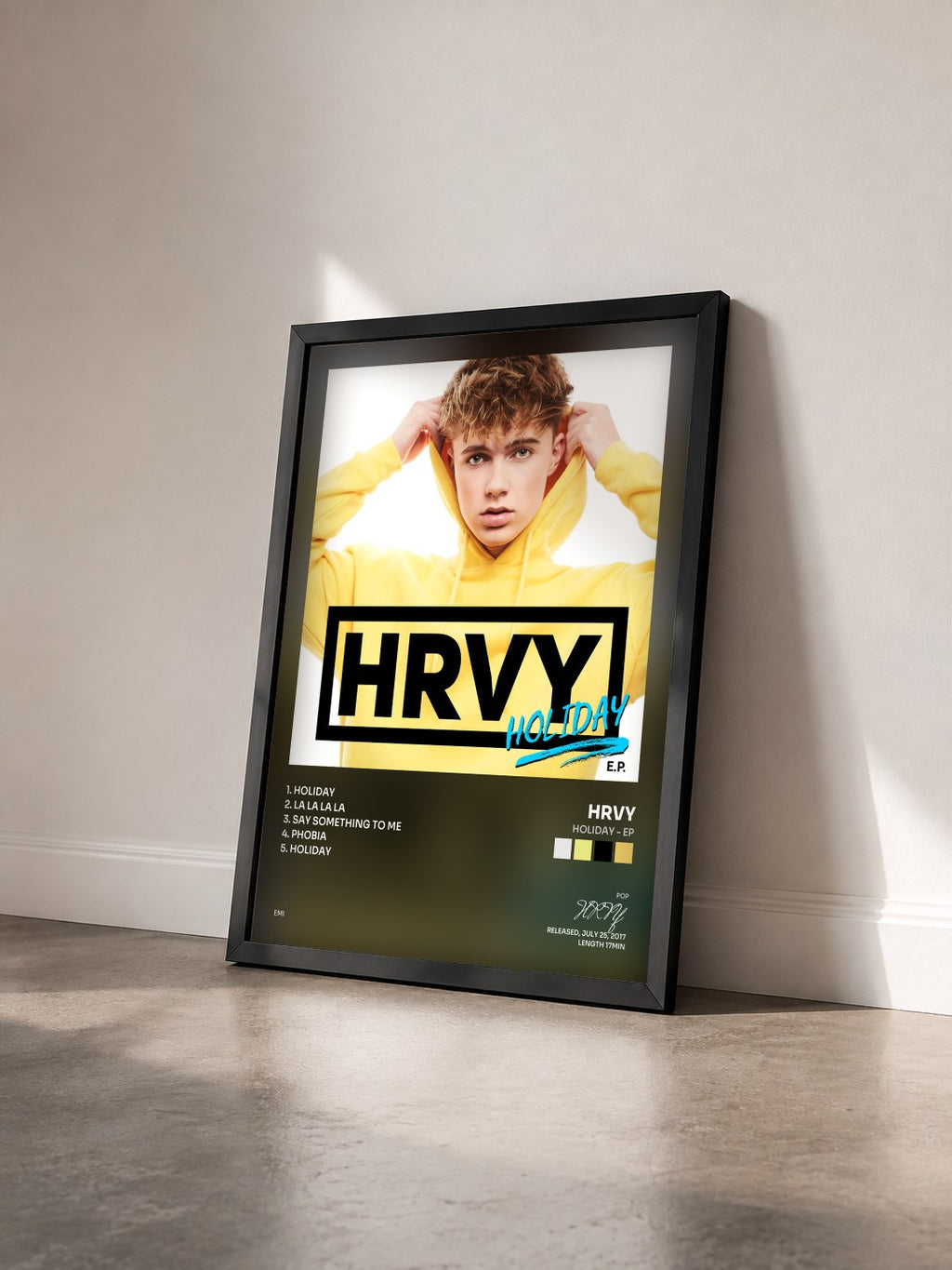#noir Tableau de l'album Holiday - EP de HRVY vu de trois quarts, cadre noir