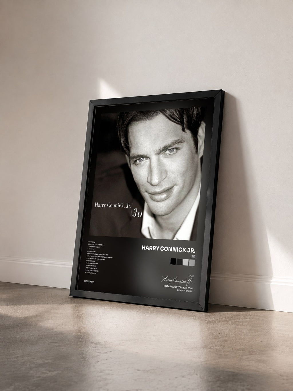 #noir Tableau de l'album 30 de Harry Connick Jr. vu de trois quarts, cadre noir