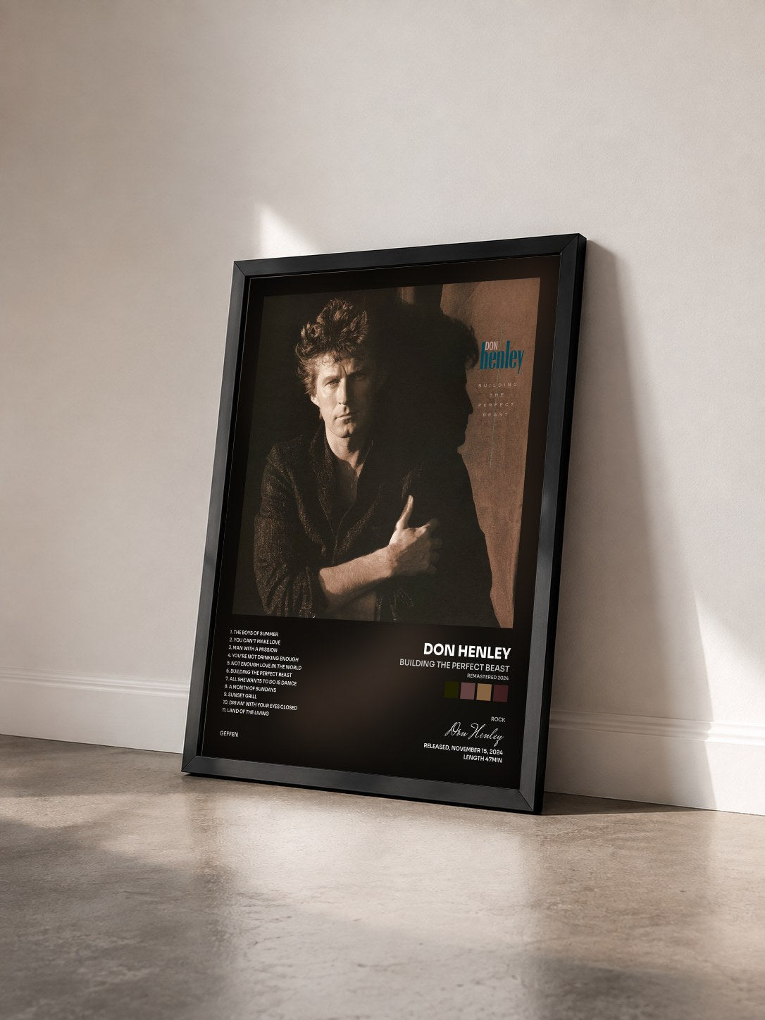 #noir Tableau de l'album Building The Perfect Beast (Remastered 2024) de Don Henley vu de trois quarts, cadre noir