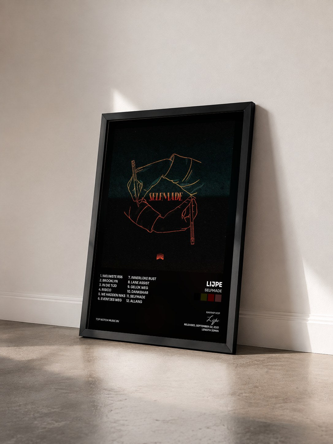 #noir Tableau de l'album Selfmade de Lijpe vu de trois quarts, cadre noir