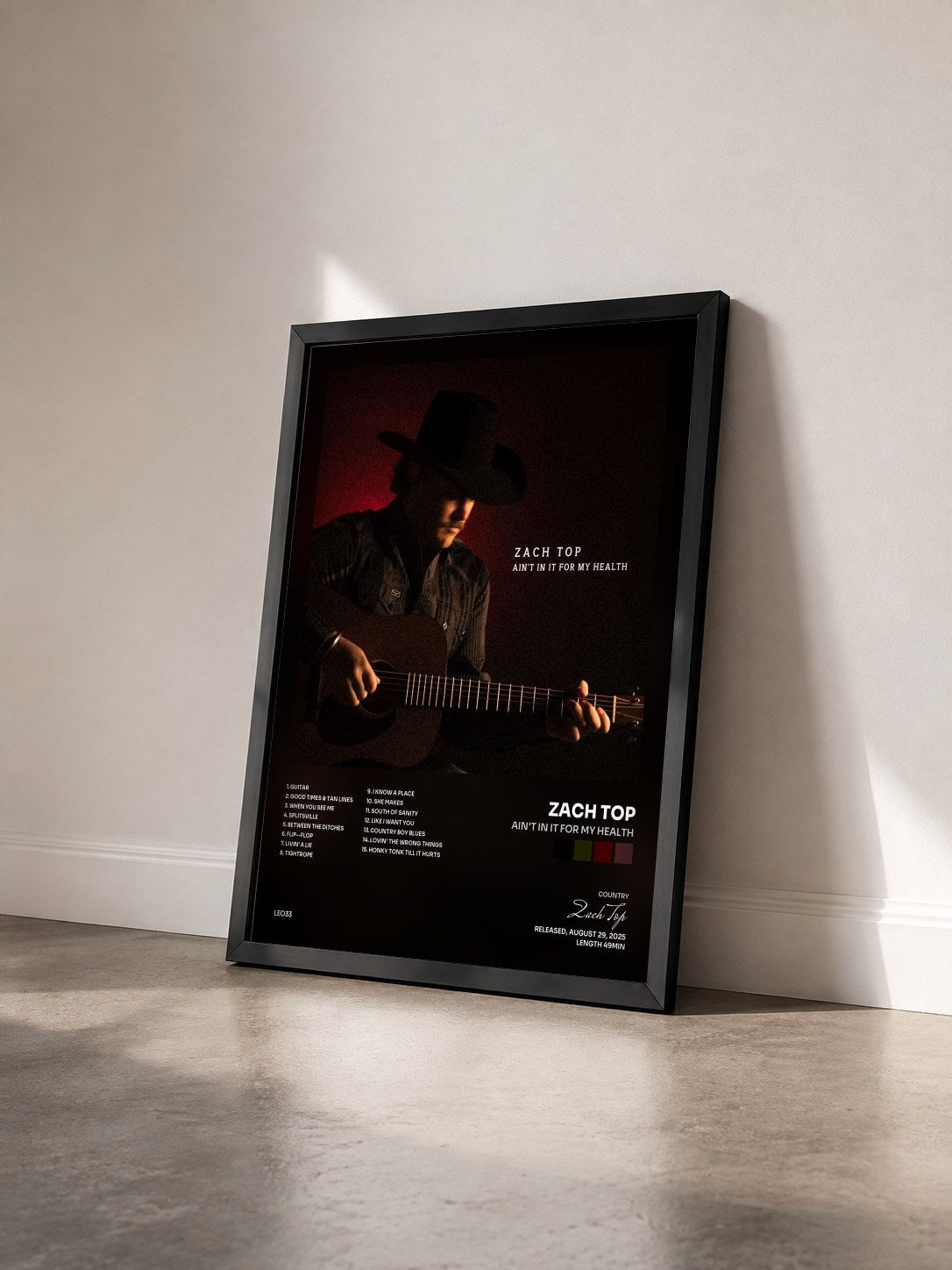 #noir Tableau de l'album Ain't In It For My Health de Zach Top vu de trois quarts, cadre noir