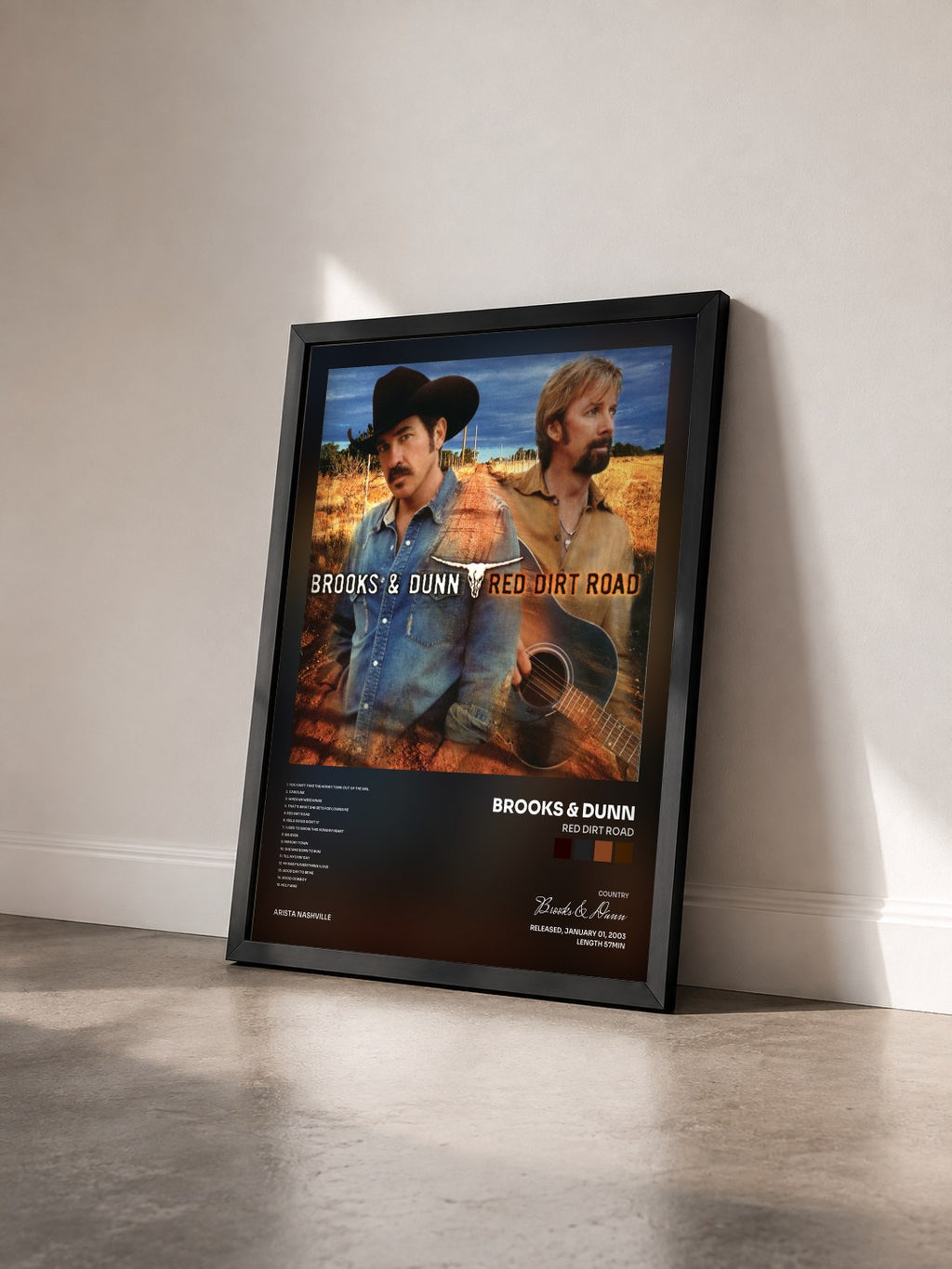 #noir Tableau de l'album Red Dirt Road de Brooks & Dunn vu de trois quarts, cadre noir